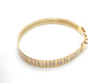 Tri-Gold Over Sterling Silver Flexible Bangle Bracelet