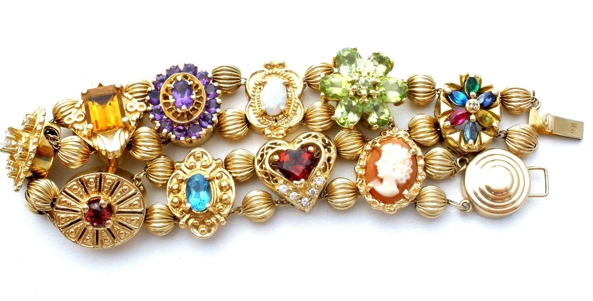 Late 1800s Slide Bracelet, Mixture Of 14K, 10K, And Gold Filled Charms –  Yarnal Jewelers