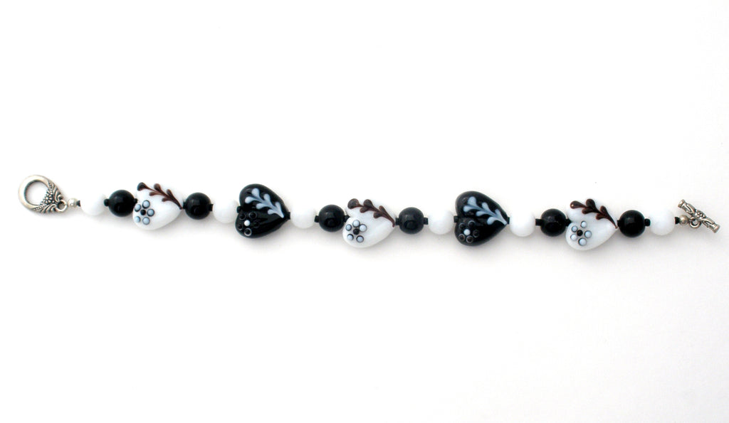 Love these black and white beads!!  Lampwork bead jewelry, Polymer clay  bracelet, Beaded jewelry